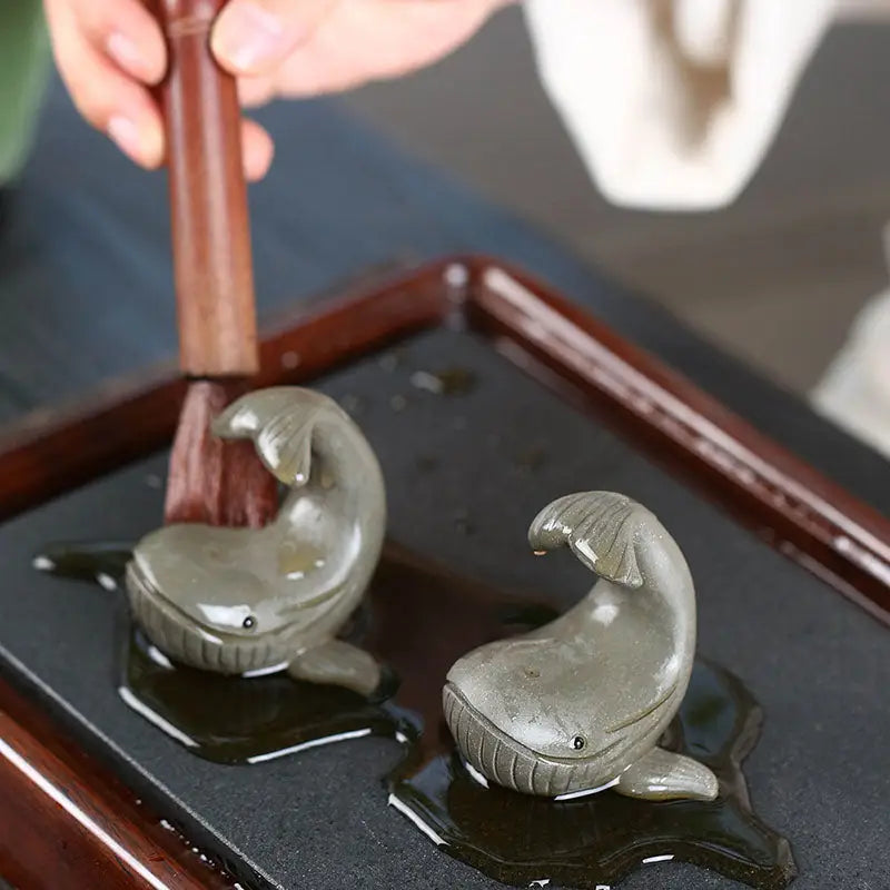 Ocean Whisper whale tea pet figurines made from Yixing Zisha clay for tea enthusiasts