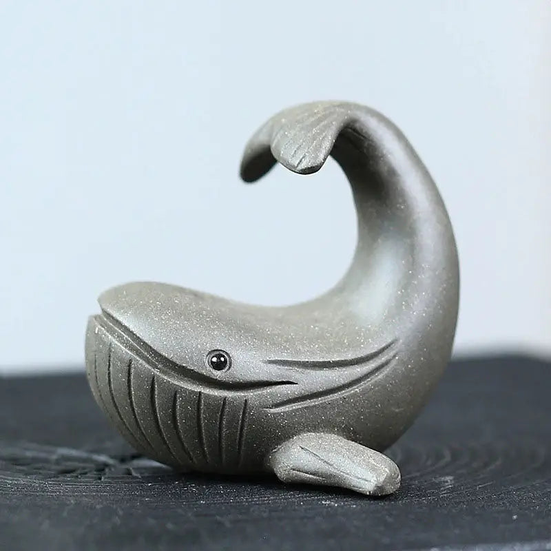 Gray ceramic whale figurine from Ocean Whisper, perfect whale tea pet and Yixing Zisha clay guide