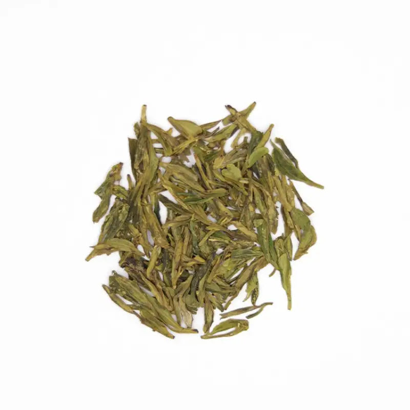 Pile of dried Longjing green tea leaves from Old Tree Longjing 2025 harvest, Xitou Mountain