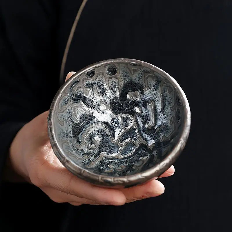 Swirled black and silver ceramic Oni zhan tea bowl for jian zhan tea brewing