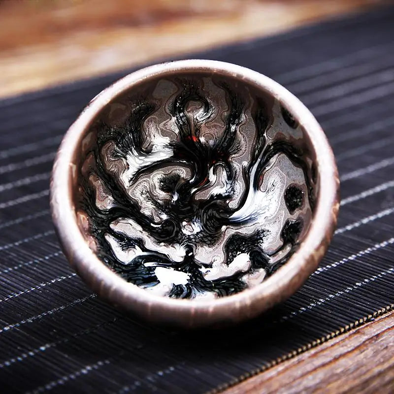 Swirling black and silver ceramic bowl from Oni Tea Set perfect for tea lovers