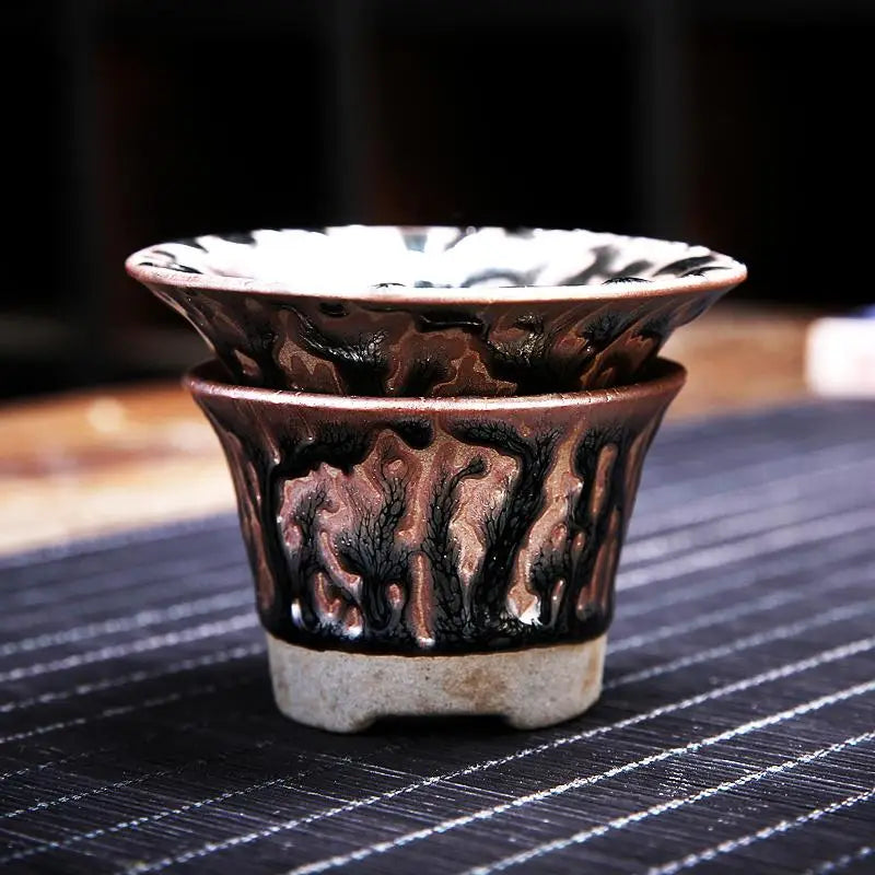 Two-tiered ceramic tea strainer from Oni Tea Set for a perfect tea experience