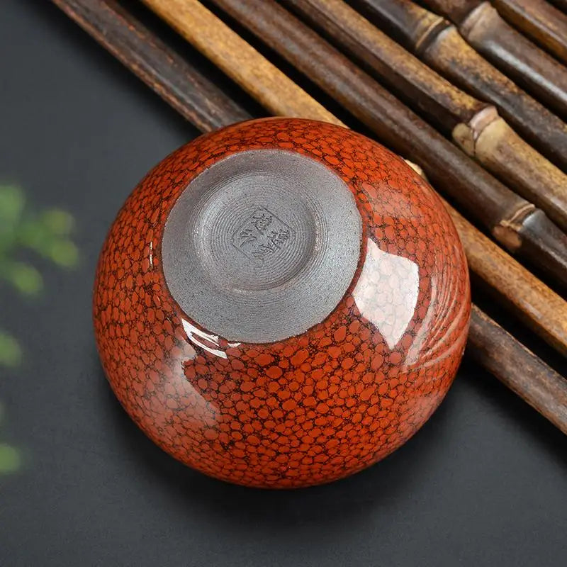 Red-speckled ceramic bowl from Jian Zhan collection in burnt orange by Jianyang Jian Zhan