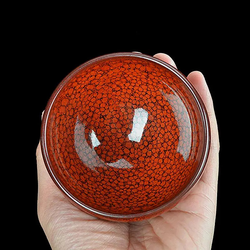 Red and black speckled bowl from Jian Zhan collection in burnt orange finish