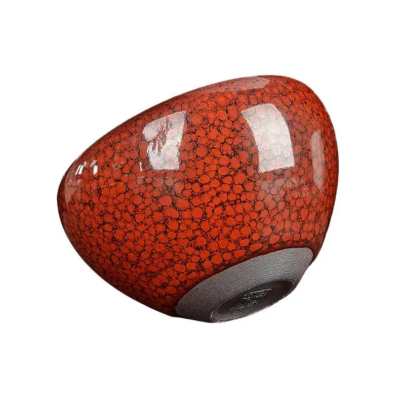 Red and black speckled ceramic bowl from Jian Zhan collection in burnt orange color