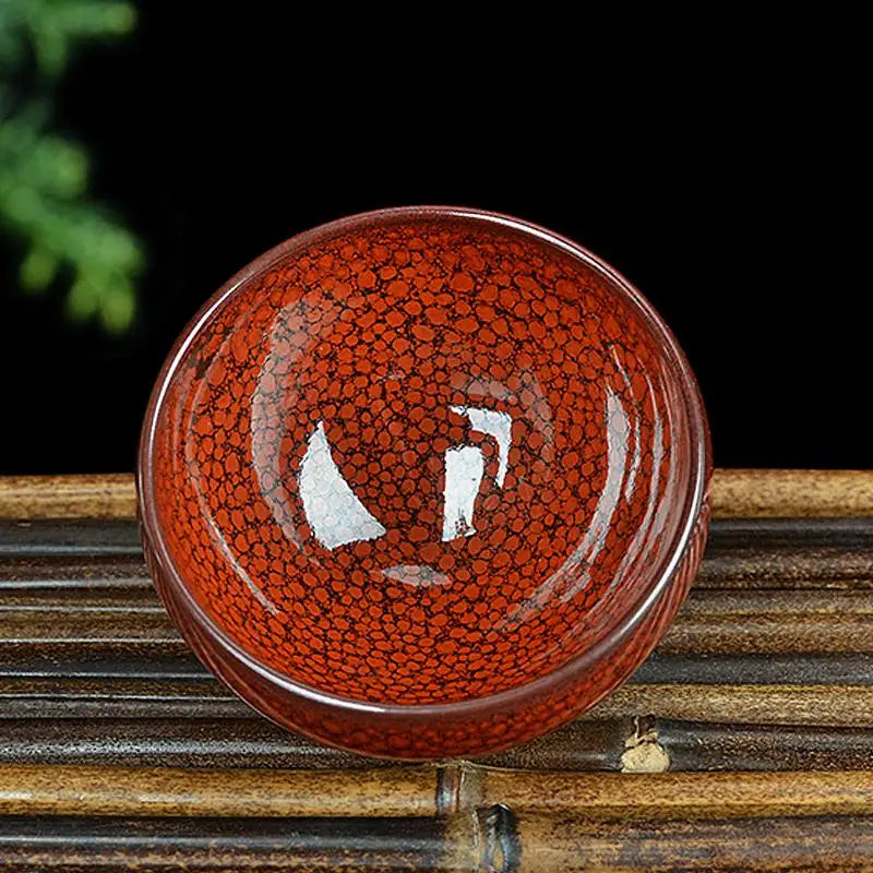 Red-brown speckled ceramic bowl by Jian Zhan from Jianyang Jian Zhan in burnt orange style