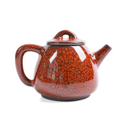 Brown speckled ceramic teapot with glazed texture for Gongfu tea, crafted from Jianshui red clay