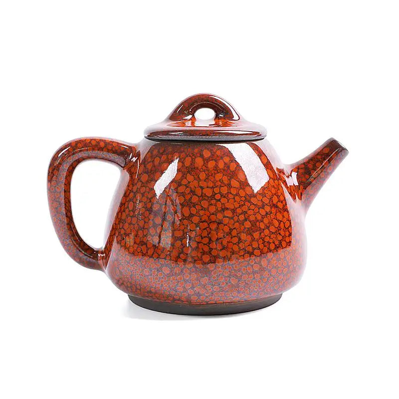Brown speckled ceramic teapot with glazed texture for Gongfu tea, crafted from Jianshui red clay