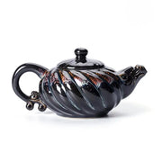 Black ceramic Palm Teapot with tenmoku glaze, ideal for gongfu tea brewing
