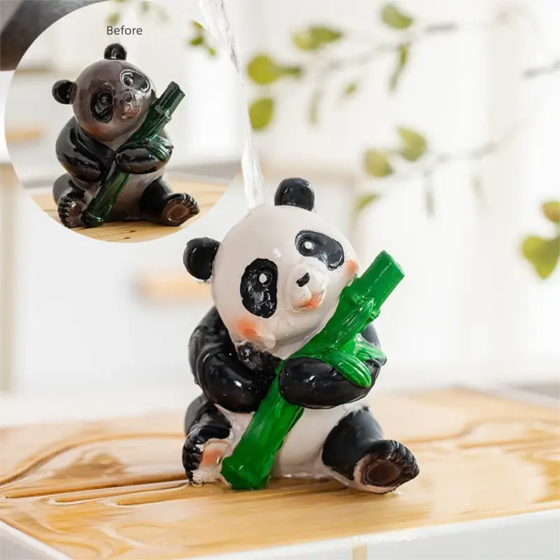 Cute panda figurine holding bamboo, ideal as a Feng Shui tea pet in eco-friendly resin for color-changing panda tea displays