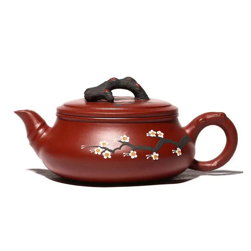 Reddish-brown handcrafted Yixing Zisha teapot with Plum Blossom motif for Gongfu tea