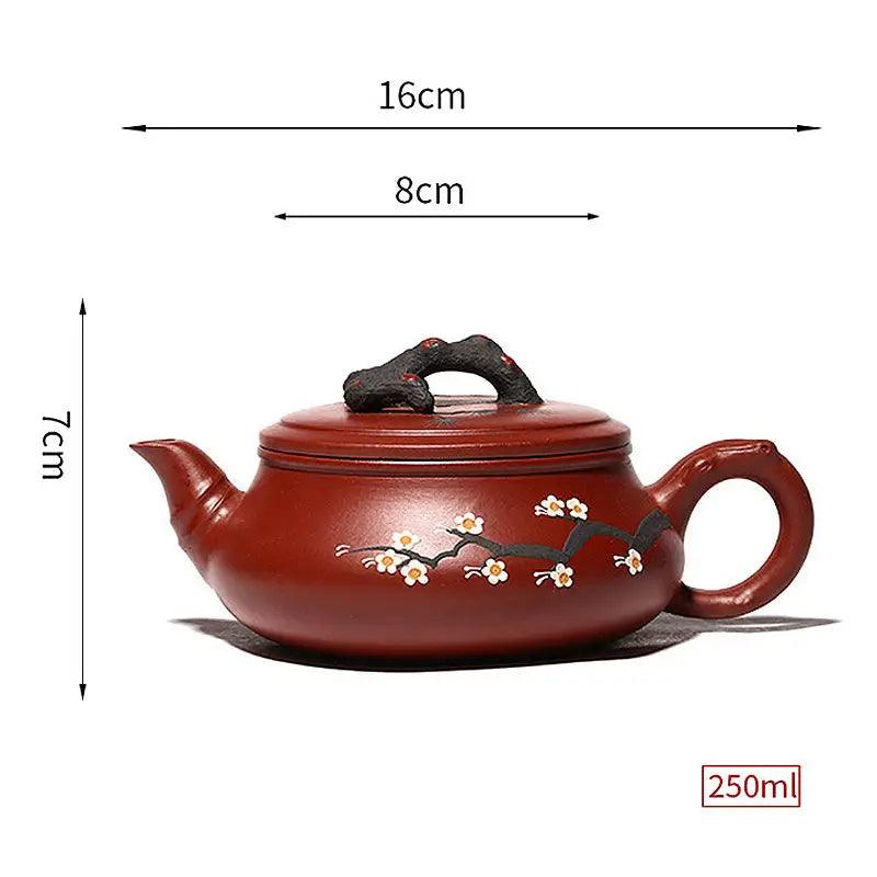 Red-brown handcrafted Yixing Zisha teapot with floral Plum Blossom motif for gongfu tea