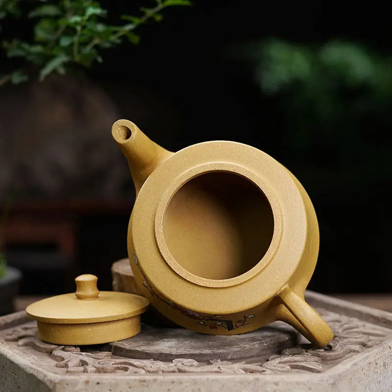 Earthenware teapot with removable lid from Plum Flower tea sets, perfect for brewing tea