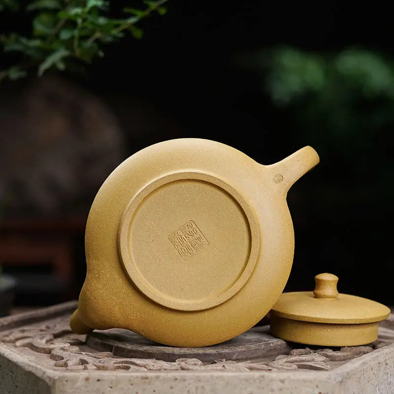 Yellow ceramic teapot with lid from Plum Flower tea set, perfect for teapots and mugs