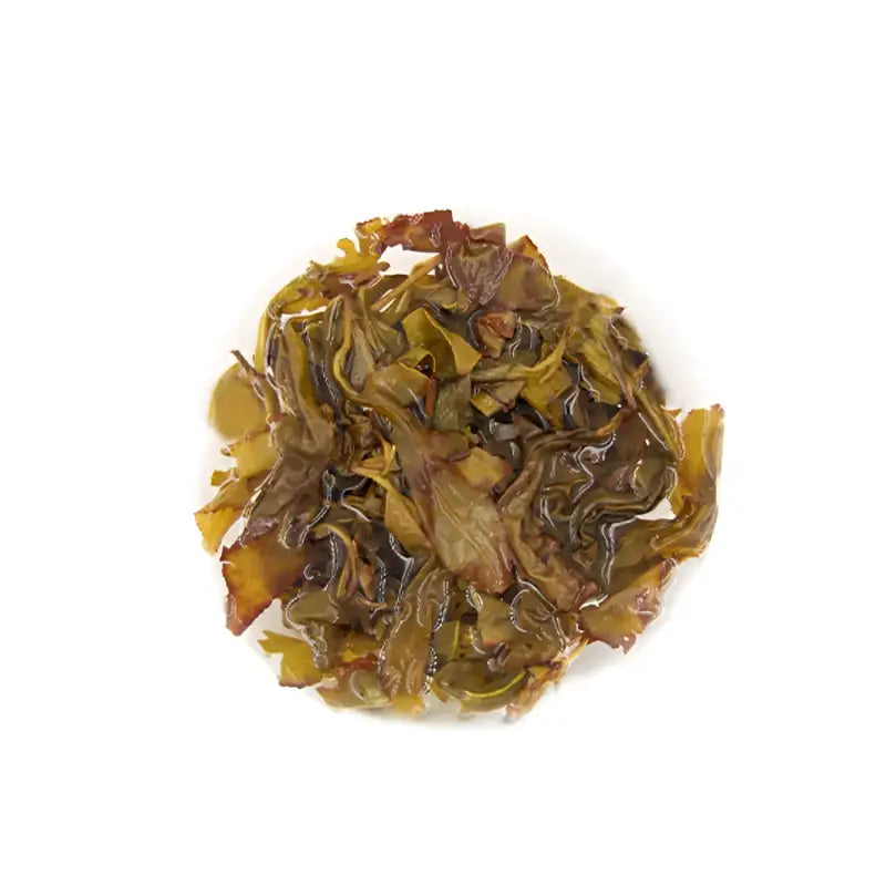 Pile of dried tea leaves for Premium Jasmine Magnolia Dancong Zhangping Shuixian oolong