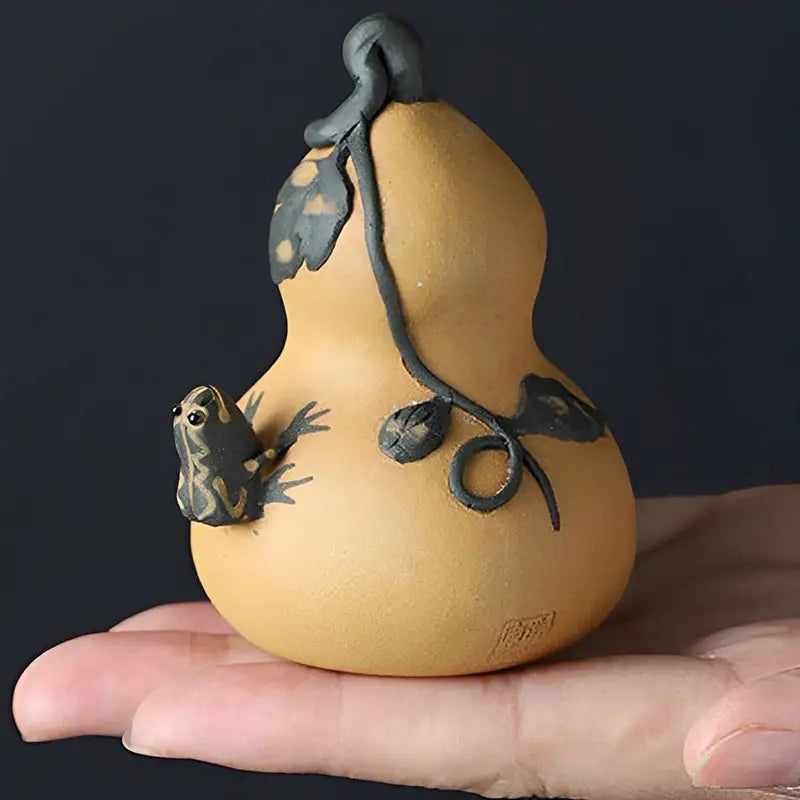 Ceramic prosperity gourd tea pet with frog and vine design in Yixing clay