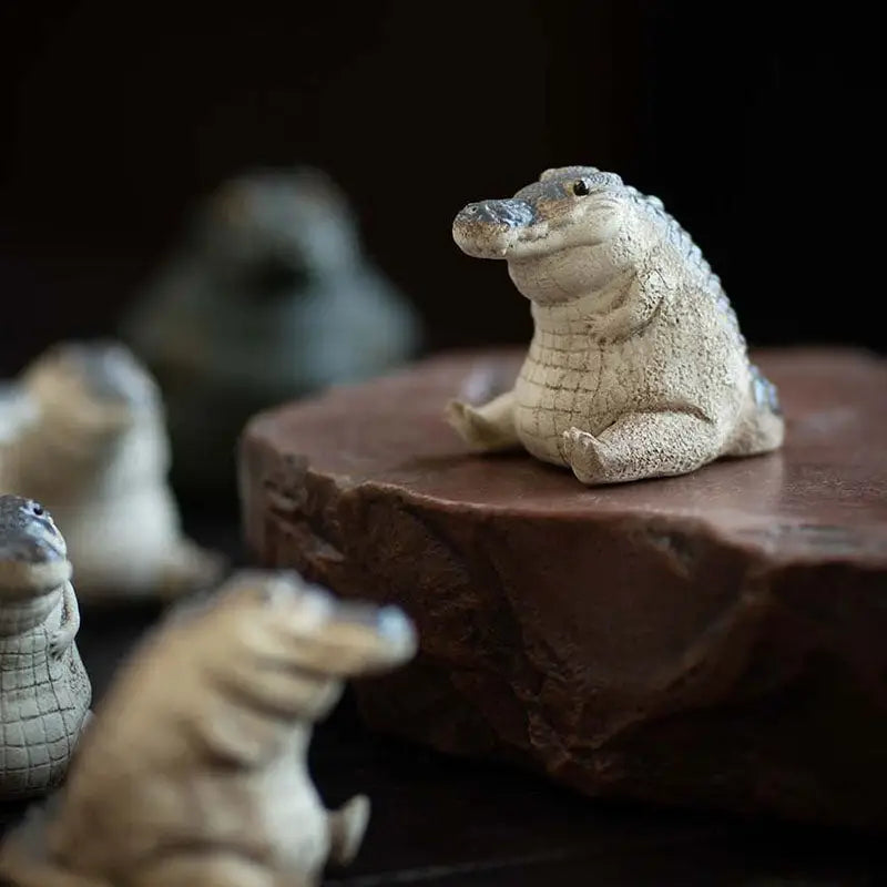 Cute Prosperous Alligator tea pet figurine from the tea pets guide collection