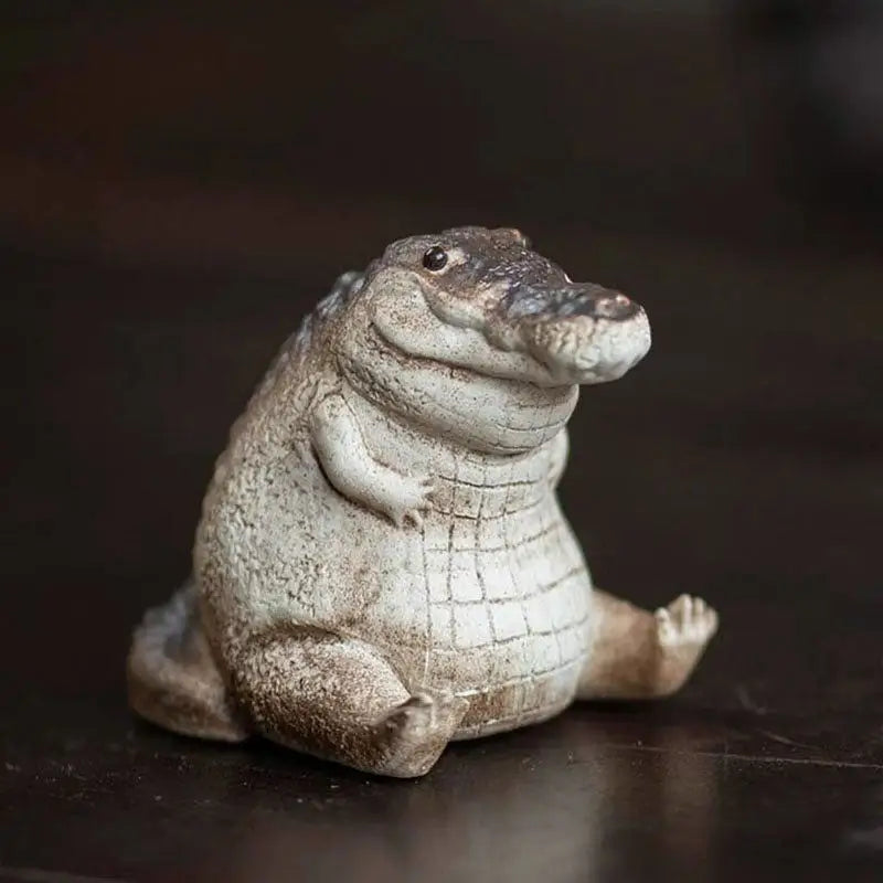 Chubby ceramic alligator figurine from Prosperous Alligator tea pets guide, perfect alligator tea pet
