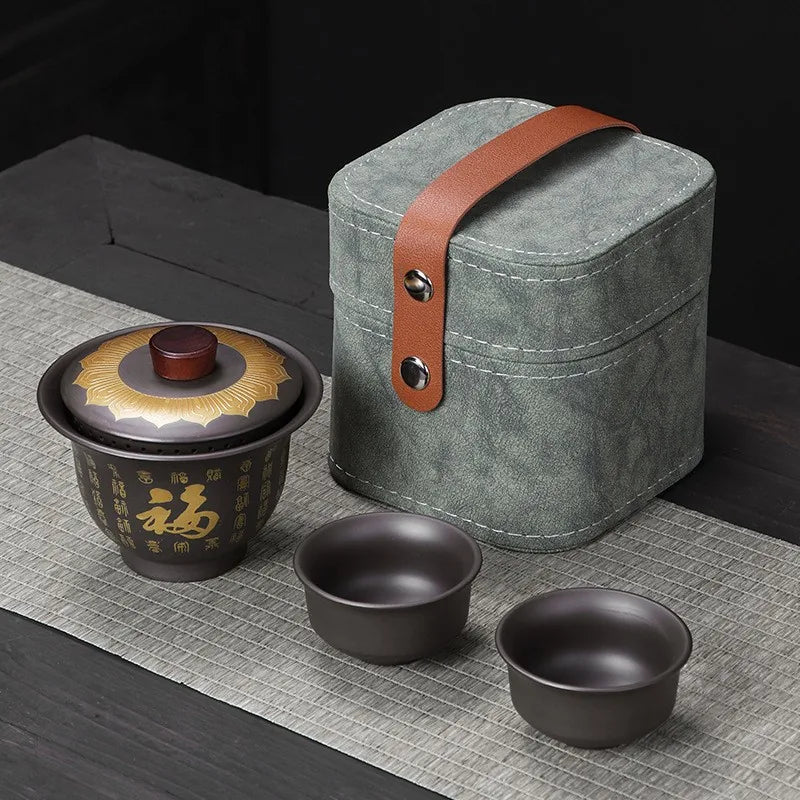 Purple clay gaiwan travel tea set with gold-traced characters, two cups and gift box – photo 1