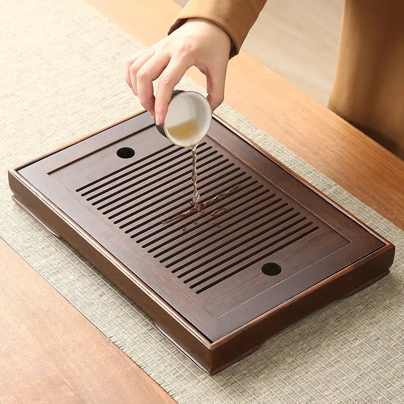 Dark brown wooden tea tray from Quiet Stream compact bamboo tea tray collection