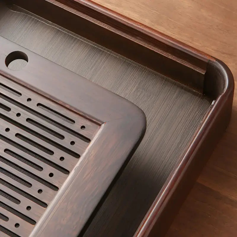 Dark brown wooden tea tray from Quiet Stream Bamboo for Gongfu tea rituals