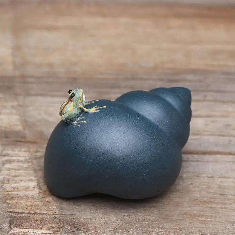 Raincaller frog figurine perched on dark blue snail shell tea pet for Yixing clay teapots
