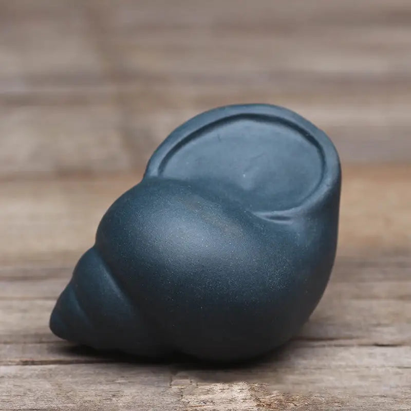 Dark blue snail-shaped planter from Raincaller Frog, perfect for tea pets guide or yixing clay teapot display