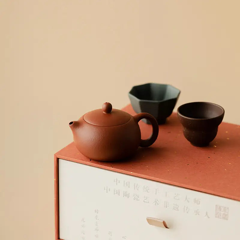 Red Harmony Yixing Zisha Earthenware Teapot and Cups for a traditional tea experience
