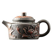 Brown ceramic Relief Lotus teapot with lotus flower design in Jianshui Zitao black clay