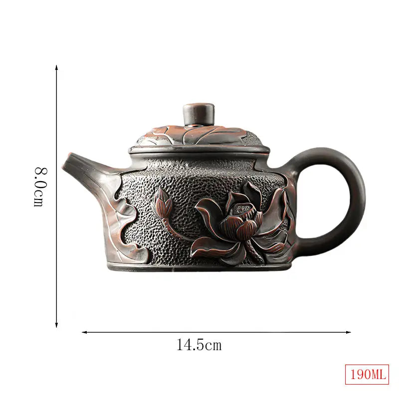 Relief Lotus textured brown Jianshui Zitao black clay teapot with floral relief design