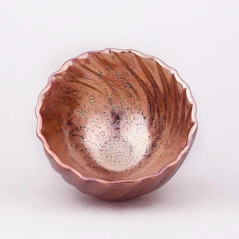 Textured copper-colored decorative bowl from Rose Gold collection featuring tenmoku glaze design