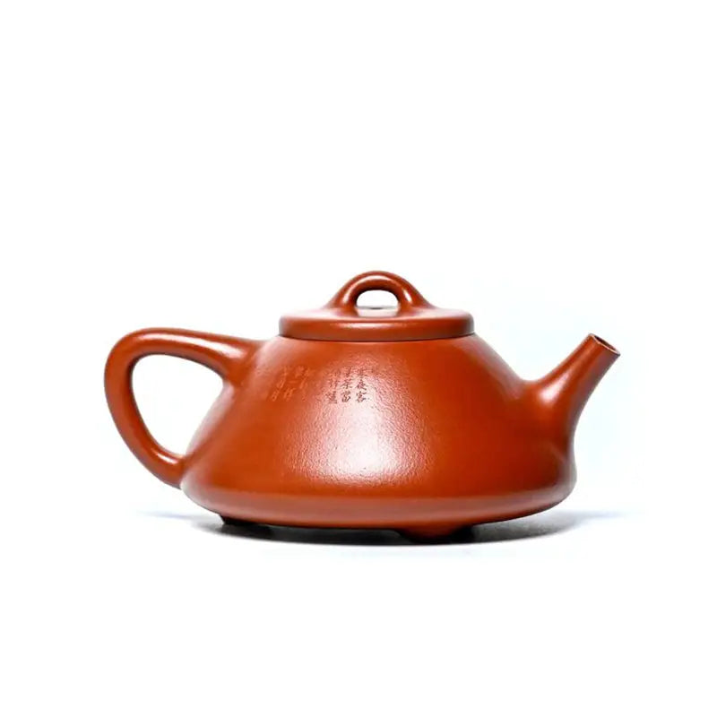 Earthenware Yixing teapot with handle and lid for Gongfu tea, made from Zhuni clay