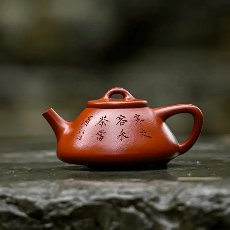 Reddish-brown Yixing teapot made from Zhuni clay for Gongfu tea brewing