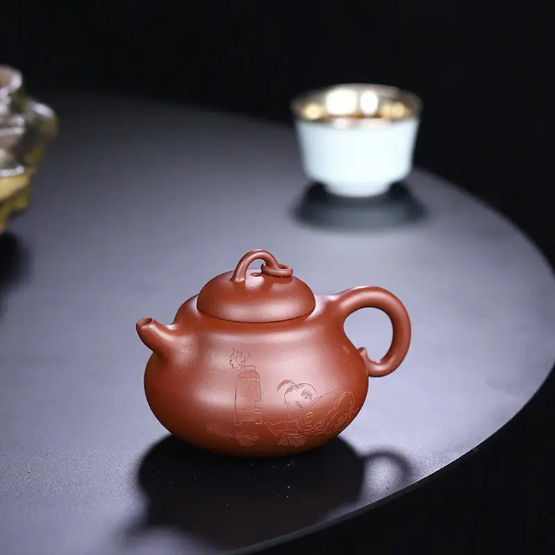 Brown ceramic Yixing Zisha teapot from Scholar’s Rest handcrafted Yixing pottery