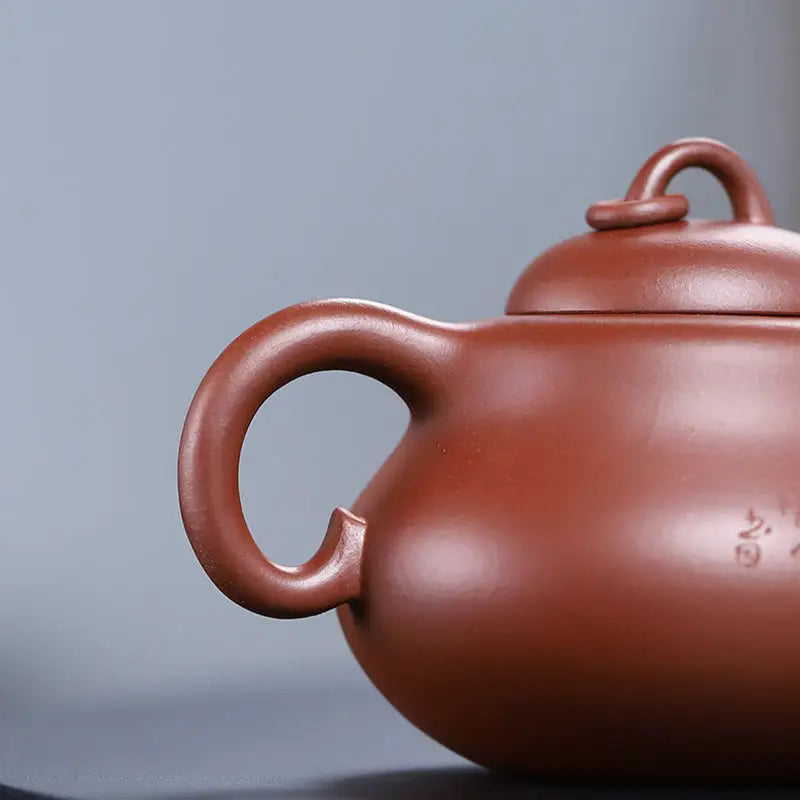 Reddish-brown handcrafted Yixing Zisha teapot from Scholar’s Rest collection
