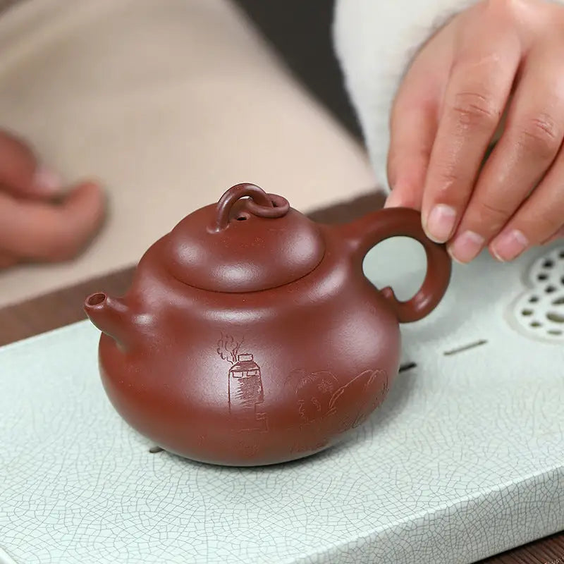 Reddish-brown handcrafted Yixing Zisha teapot Scholar’s Rest with handle and lid