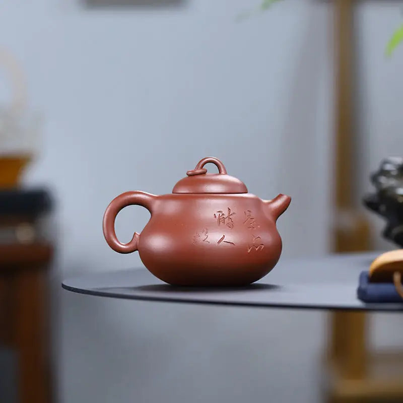 Reddish-brown handcrafted Yixing Zisha teapot from Scholar’s Rest with elegant design