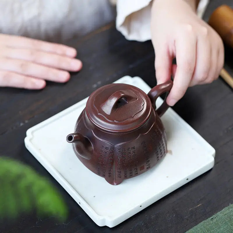 Brown ceramic teapot from Scripture Serenity featuring Yixing Zisha and Heart Sutra design