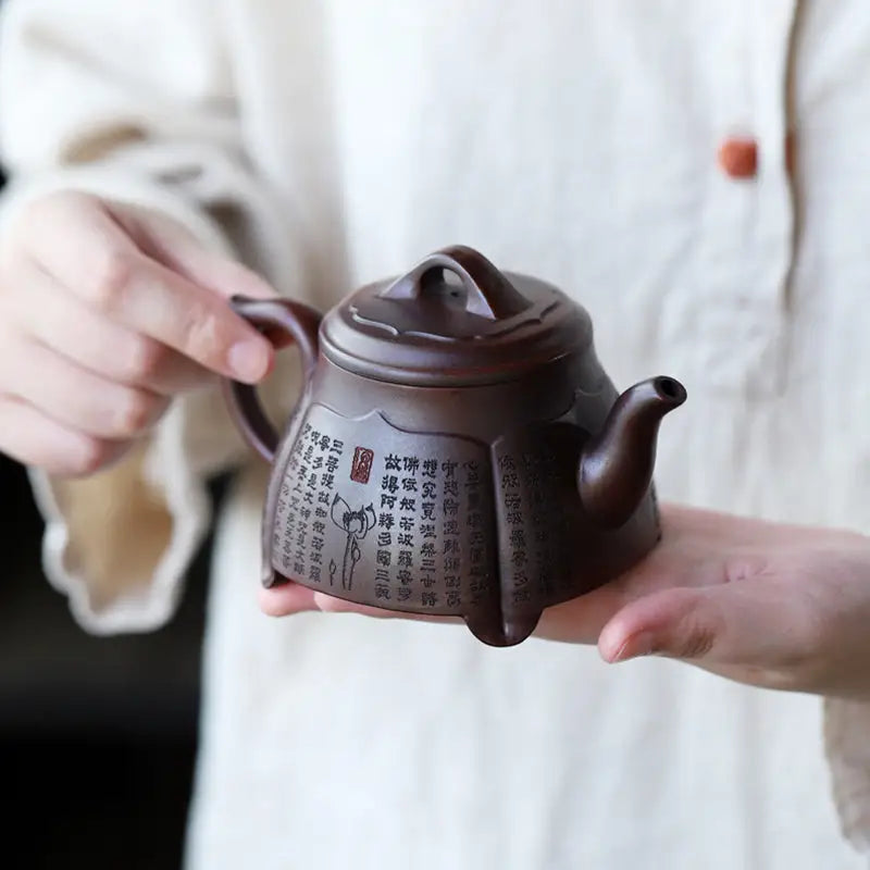 Ornate brown Yixing Zisha teapot from Scripture Serenity collection featuring Heart Sutra design