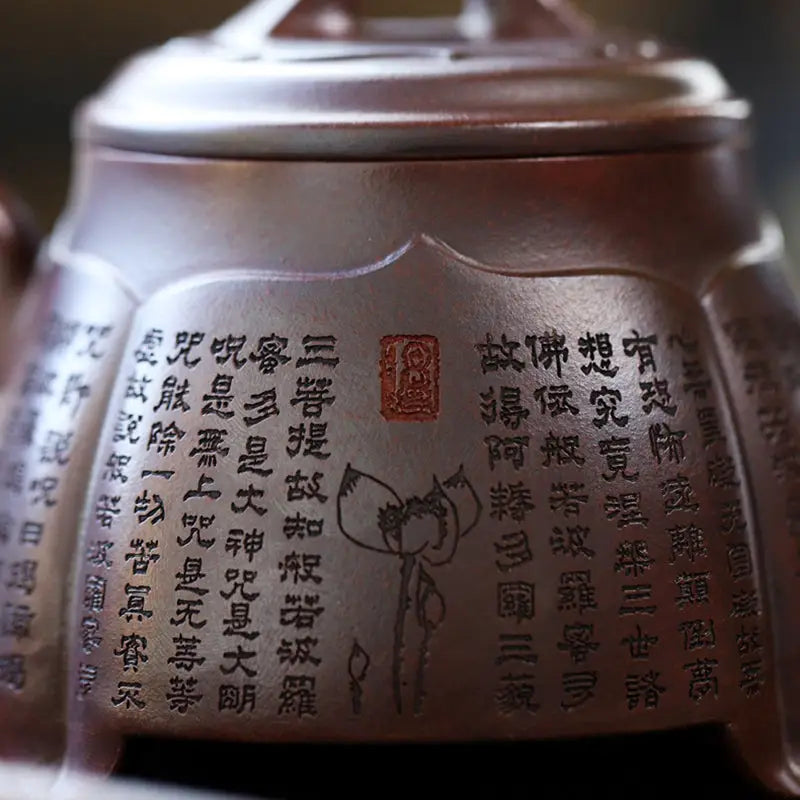 Engraved brown Yixing Zisha teapot with scripture serenity and heart sutra design