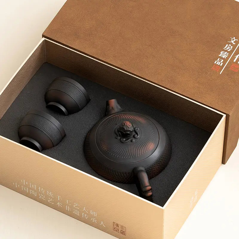 Shadow Lion Tea Set featuring Yixing Zisha teapot set in a stylish box