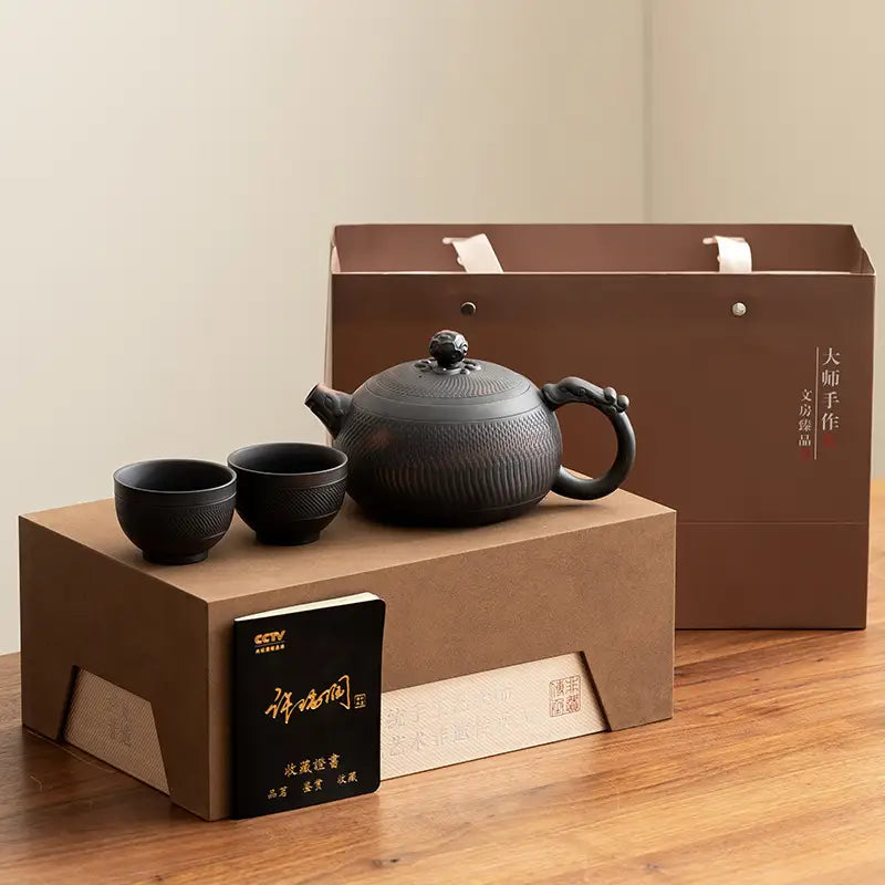 Dark textured Shadow Lion Yixing Zisha teapot set for traditional tea brewing