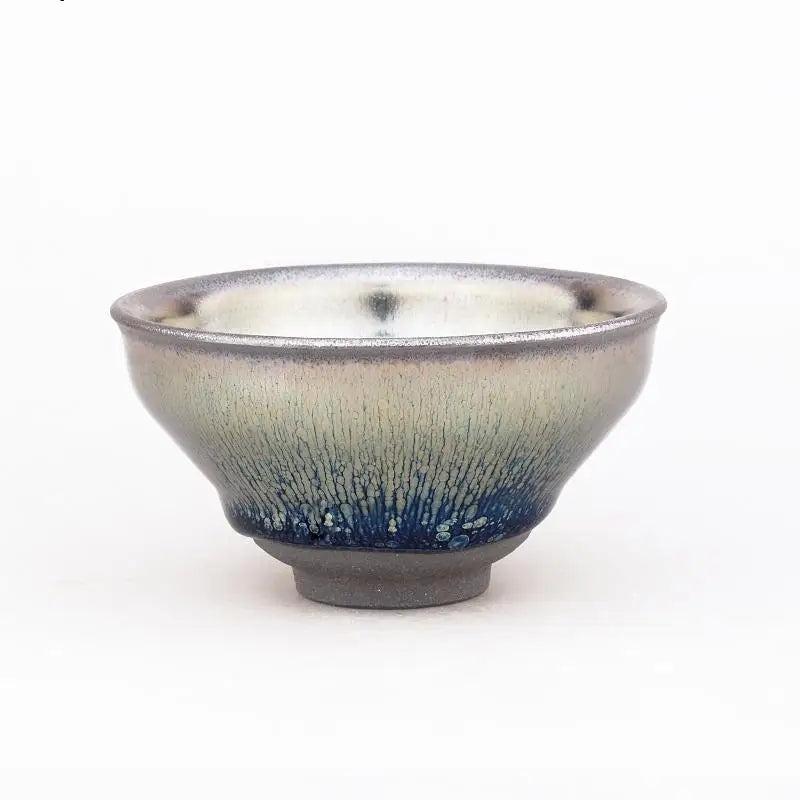 Shiny Jian Zhan ceramic teacup with reflective iridescent glaze for a stylish tea experience