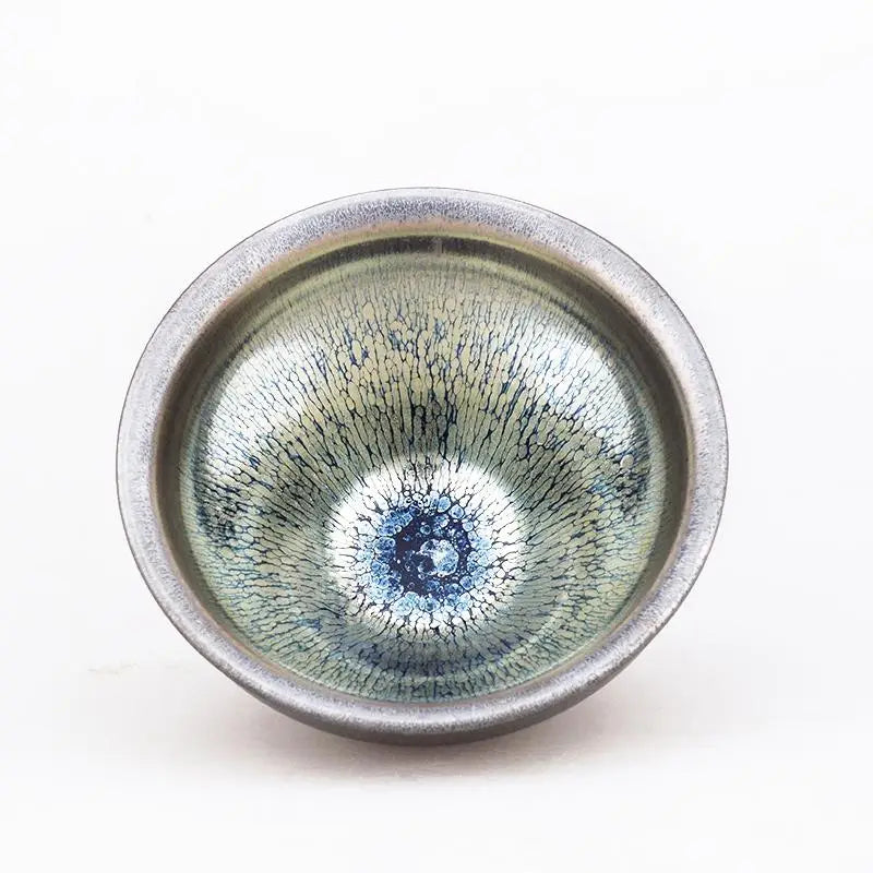 Shiny Jian Zhan ceramic teacup with iridescent reflective glaze for elegant tea serving