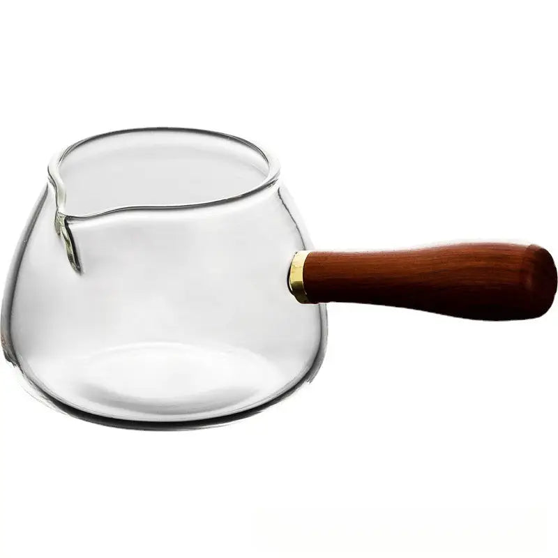 Glass tea pitcher with wooden handle in side-handled borosilicate glass design