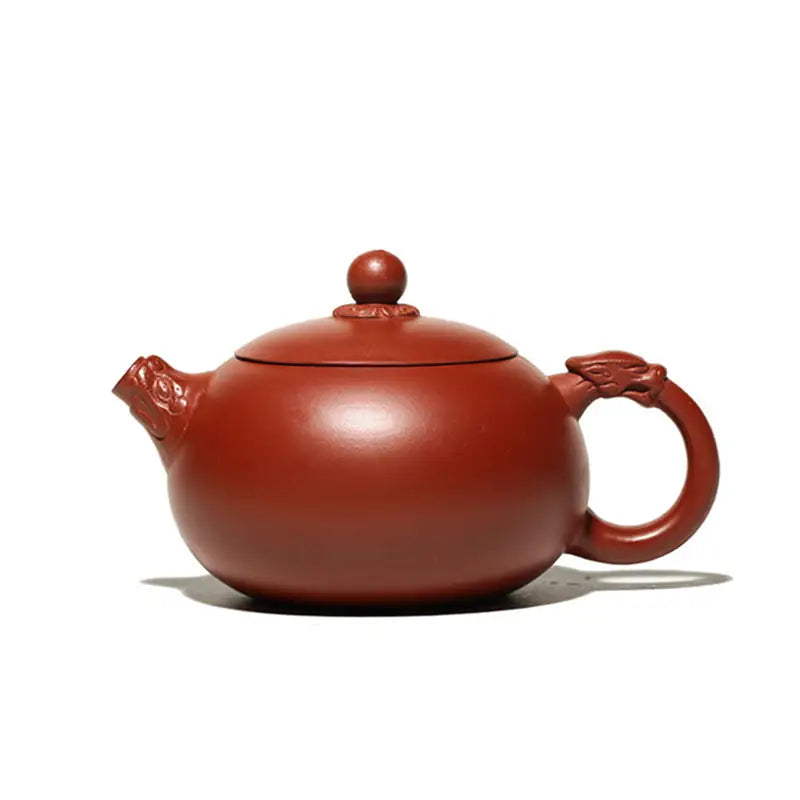 Reddish-brown Yixing Zisha teapot Silent Sentinel with dragon handle, authentic purple ceramic