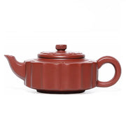 Red-brown ceramic teapot made from Yixing Zisha clay in the Silken Ridge collection