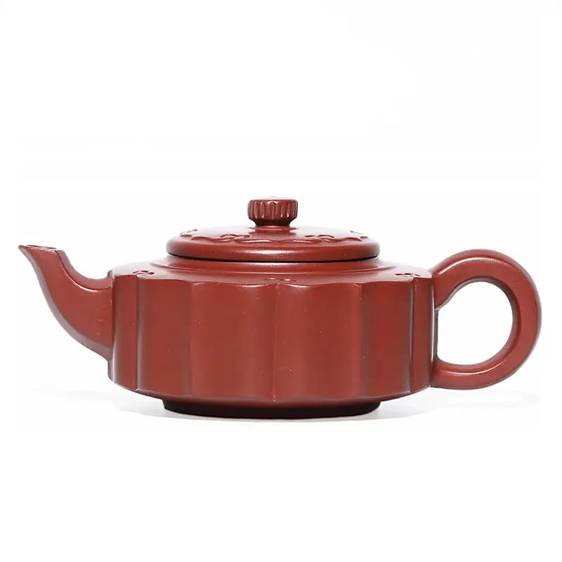 Red-brown ceramic teapot made from Yixing Zisha clay in the Silken Ridge collection