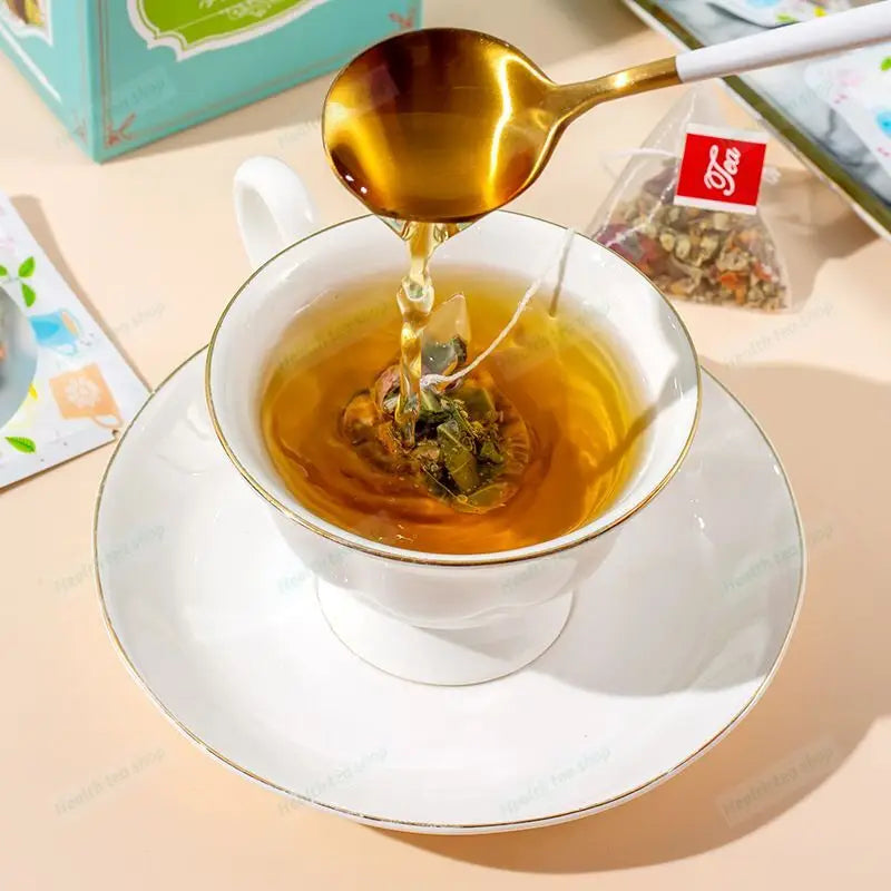 Pouring herbal slimming tea with lotus leaf into a teacup promotes intestinal motility