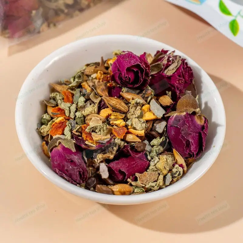 Bowl of herbal tea blend featuring Lotus Leaf to promote intestinal motility for slimming tea